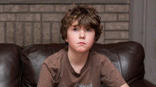Third-Grader Watching Another Year Of Back To School Commercials Suddenly Realizes He’ll Die One Day<em></em>